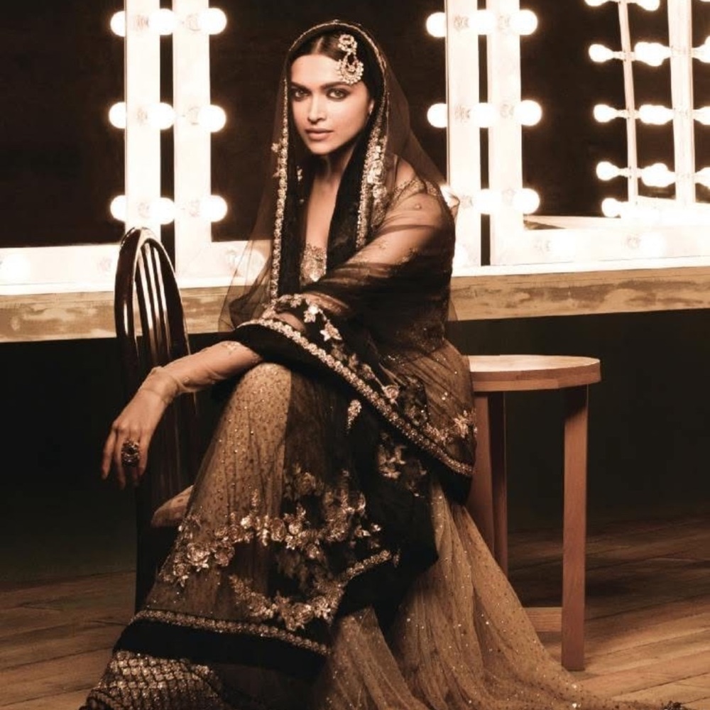 Elegant Black and Gold heavyly Embroidered gown and dupatta